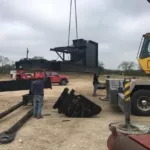 Moving in and setting up oil exploration pumping unit